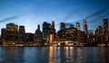 New York City. Manhattan downtown skyline with illuminated Empire State Building and skyscrapers at dusk. Royalty Free Stock Photo