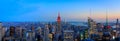 Manhattan downtown skyline with illuminated Empire State Building and skyscrapers at sunset Royalty Free Stock Photo