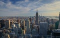 Manhattan downtown skyline with illuminated Empire State Building and skyscrapers at sunset Royalty Free Stock Photo