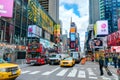 NEW YORK CITY, MANHATTAN, OCT,25, 2013: NYC Times Square lights screens buildings fashion boutiques architecture and advertising l Royalty Free Stock Photo