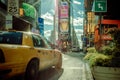 New York Manhattan Times Square View Behind a Yellow Cab. Beautiful District Full of LED Screens, Billboards and Advertisemen Royalty Free Stock Photo