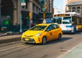 New York City - March 20, 2017 : Yellow taxi cab speeds down in a New York City Street. Shot with long shutter speed for Royalty Free Stock Photo