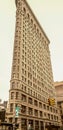 NEW YORK CITY - MAY 22, 2013: Flatiron Building on a spring day. Completed in 1902, it is considered to be one of the first Royalty Free Stock Photo