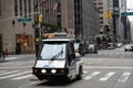 Rockefeller Plaza streets are empty in New York City. Radio City Music Hall. Police car.