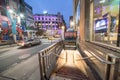 NEW YORK CITY - NOVEMBER 30, 2018: Night view of Herald Square subway entrance with tourists. The city attracts 50 million people Royalty Free Stock Photo