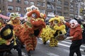 New York City, NY- February 12, 2023: Colorful dragons and a clown march down Mott Street in Chinatown, as part of the annual New 