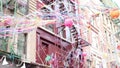 Streamers and confetti in the streets of Chinatown during New Year celebration.
