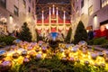 Christmas season decorations at Rockefeller Center Plaza with view of Saks Fifth Avenue holiday light display. New York City Royalty Free Stock Photo