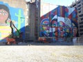 Eduardo Kobra\'s grafitti mural. Brazilian street Artist, NYC, West Village. Title Immigrants. Royalty Free Stock Photo