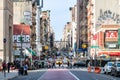 The sidewalks of Canal Street and Broadway are crowded with people in New York City