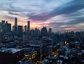 New York City skyline lights at dusk with colorful sky above the buildings of Lower Manhattan Royalty Free Stock Photo