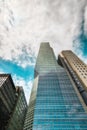 New York City Skyscrapers, Cloudy Sky Background. Architecture, Modern, Vertical Image, Low Angle View Royalty Free Stock Photo