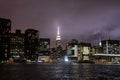 The New York City Skyline at night from the East River looking at Manhattan