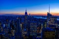 New York City skyline at night - skyscrapers of midtown Manhattan with Empire State Building at Amazing Sunset - USA Royalty Free Stock Photo