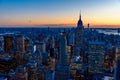 New York City skyline at night - skyscrapers of midtown Manhattan with Empire State Building at Amazing Sunset - USA Royalty Free Stock Photo