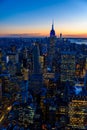 New York City skyline at night - skyscrapers of midtown Manhattan with Empire State Building at Amazing Sunset - USA Royalty Free Stock Photo
