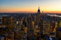 New York City skyline at night - skyscrapers of midtown Manhattan with Empire State Building at Amazing Sunset - USA Royalty Free Stock Photo