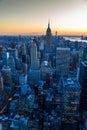 New York City skyline at night - skyscrapers of midtown Manhattan with Empire State Building at Amazing Sunset - USA Royalty Free Stock Photo