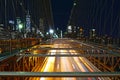 New York City skyline, traffic at the Brooklyn Bridge at night, Manhattan buildings and skyscrapers