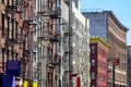 New York City style apartment buildings along Mott Street in the Royalty Free Stock Photo