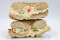 New York City Style Everything Bagel Filled with Vegetable Cream Cheese and Cut in Half Royalty Free Stock Photo