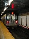 New York City Subway Train Entering Station Royalty Free Stock Photo