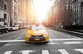 New York City taxi in yellow color in the traffic light Royalty Free Stock Photo