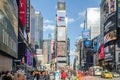 New York City Times Square on a Beautiful Sunny Day. The Most Popular Square in the World, Crowded and Full of Ãâillboards