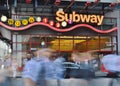 New York City Times Square 42nd Street Subway Entrance Blurred Cars and Pedestrians Rush Hour Royalty Free Stock Photo