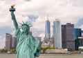 New York City tourism concept. Statue of Liberty with Lower Manhattan skyline Royalty Free Stock Photo