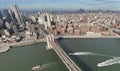 The aerial view of the bridge and skyscrapers in Manhattan, taken from a helicopter ride in New York City, U.S.A