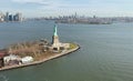 The aerial view of Statue of Liberty and Manhattan, taken from a helicopter ride