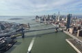 The aerial view of the bridge and skyscrapers in Manhattan, taken from a helicopter ride in New York City, U.S.A