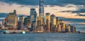 New York City, United States - December 3, 2018: Sunset skyline of Lower Manhattan as seen from a ferry boat tour around the city Royalty Free Stock Photo