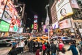 New York City, United States - Mar 31, 2019: Crowded people, car traffic transportation and billboards at Times Square Royalty Free Stock Photo