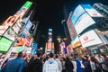 New York City, United States - Mar 31, 2019: Crowded people, car traffic transportation and billboards at Times Square Royalty Free Stock Photo