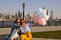 New York city urban women enjoying view of downtown Manhattan skyline, summer travel in USA