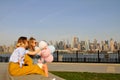 New York city urban women enjoying view of downtown Manhattan skyline, summer travel in USA