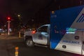 Ambulance car circulating through Harlem at night in New York City, USA