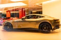New York City, USA - August 09, 2023: Ferrari Roma 2021 supercar sport car in dealership showroom, side view