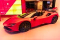 New York City, USA - August 09, 2023: Ferrari SF90 Stradale supercar sports car in showroom, corner view