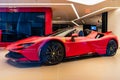 New York City, USA - August 09, 2023: Ferrari SF90 Stradale supercar sports car in showroom, low corner view