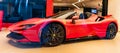 New York City, USA - August 09, 2023: Ferrari SF90 Stradale supercar sports car in showroom, side view