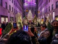 People celebrating the Christmas Holiday season at Rockefeller Center.