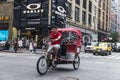 Cyclist on 5th Avenue in Manhattan, New York City, USA