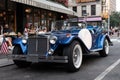 New York City, USA - June 30, 2023: Excalibur Series III phaeton car front lateral view parked