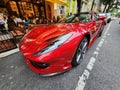New York City, USA - June 03, 2023: Ferrari 812 GTS Superfast convertible red car front lamp driver side