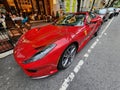 New York City, USA - June 03, 2023: Ferrari 812 GTS Superfast convertible red car front lamp driver side, parked