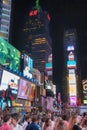 New York City, USA - June 7, 2017: People activity in Times Square at night. Times Square is a busy tourist intersection of neon Royalty Free Stock Photo