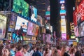 New York City, USA - June 7, 2017: People activity in Times Square at night. Times Square is a busy tourist intersection of neon Royalty Free Stock Photo